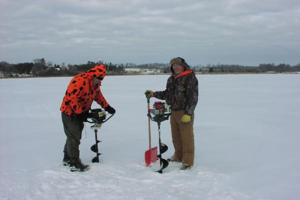 Stan Seidel and Larry Steeves used ice augers to drill through 21 inches of ice.